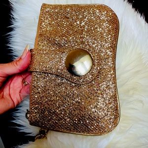Glittery gold party clutch